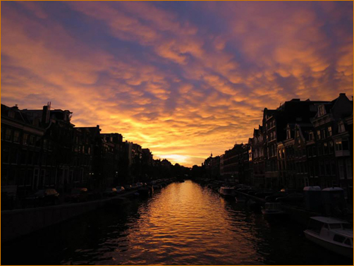 Sunset over the Amsterdam canal where Galerie Pien Rademakers is located: May, 2014
