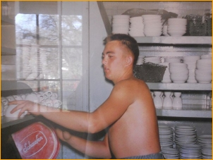 Inside First People: a picture of Adi Da as a young man, <BR>working in a similar kitchen in the Catskills