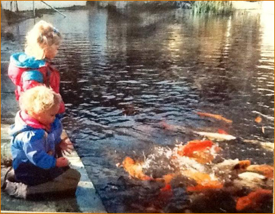 Children enjoying the koi pond  outside the Manner Of Flowers (around 1993)