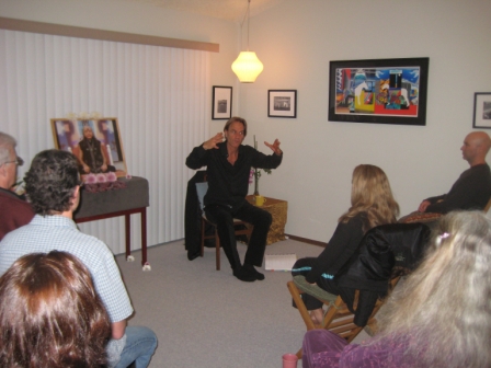 Steve Brown hosting an event in an intimate venue in Portland, Oregon