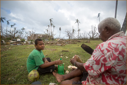 Ciqomi, after cyclone<span style="font-size=9px;font-weight=bold;">: next to the rubble that was their house