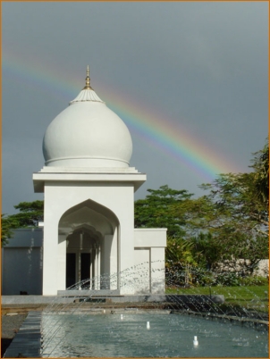 Temple Adi Da with a rainbow above it