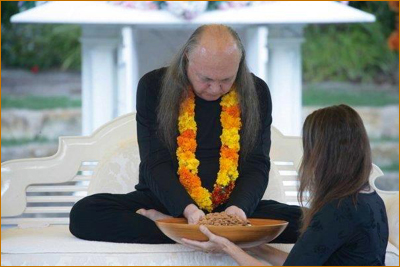 Adi Da Blessing Prasad in front of Seventh Gate